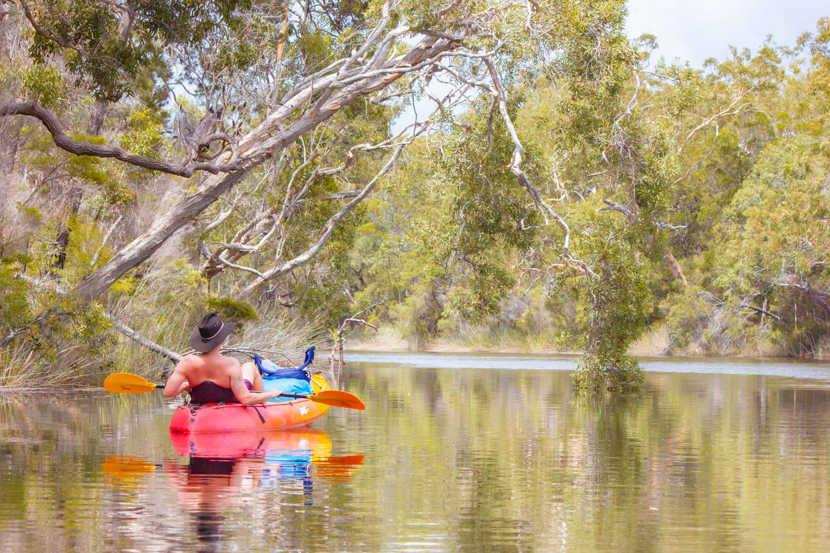 Man with black hat kayak camping upper noosa river